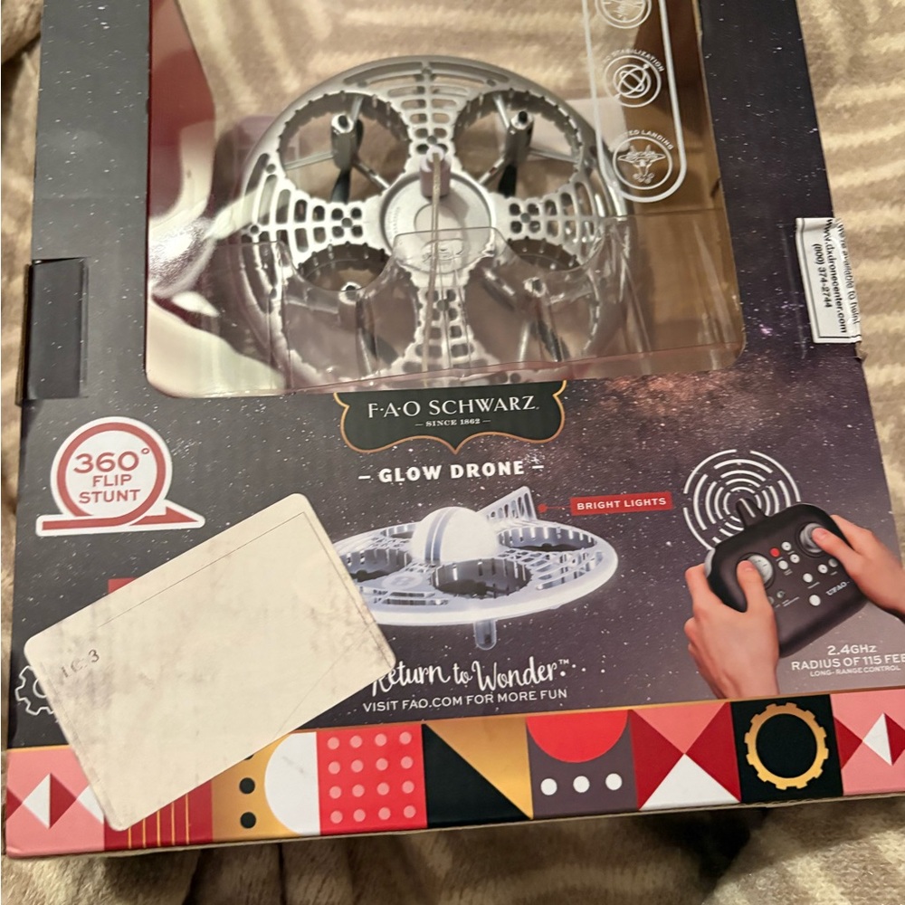 Open-box - FAO Schwarz Glow‎ Drone LED Stunt UFO Drone Lights 360° Flips Gyro